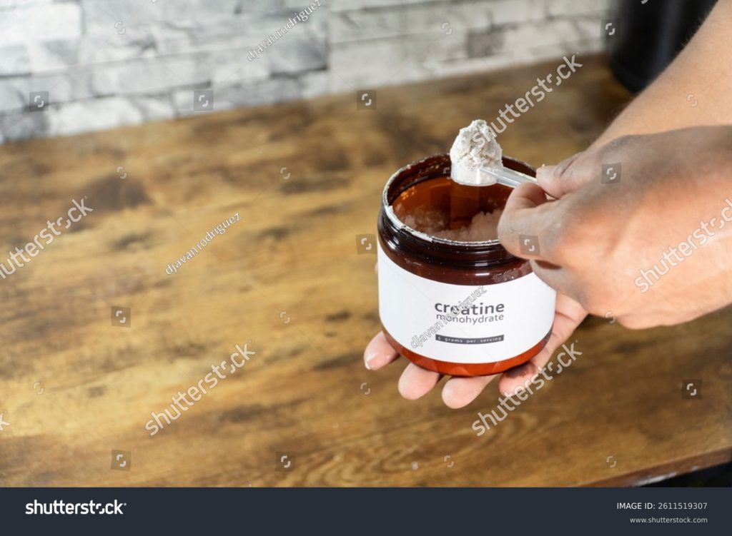 Stock Photo Hands Scooping Creatine Monohydrate Powder A Popular Supplement For Enhancing Muscle Mass 2611519307 1024x751